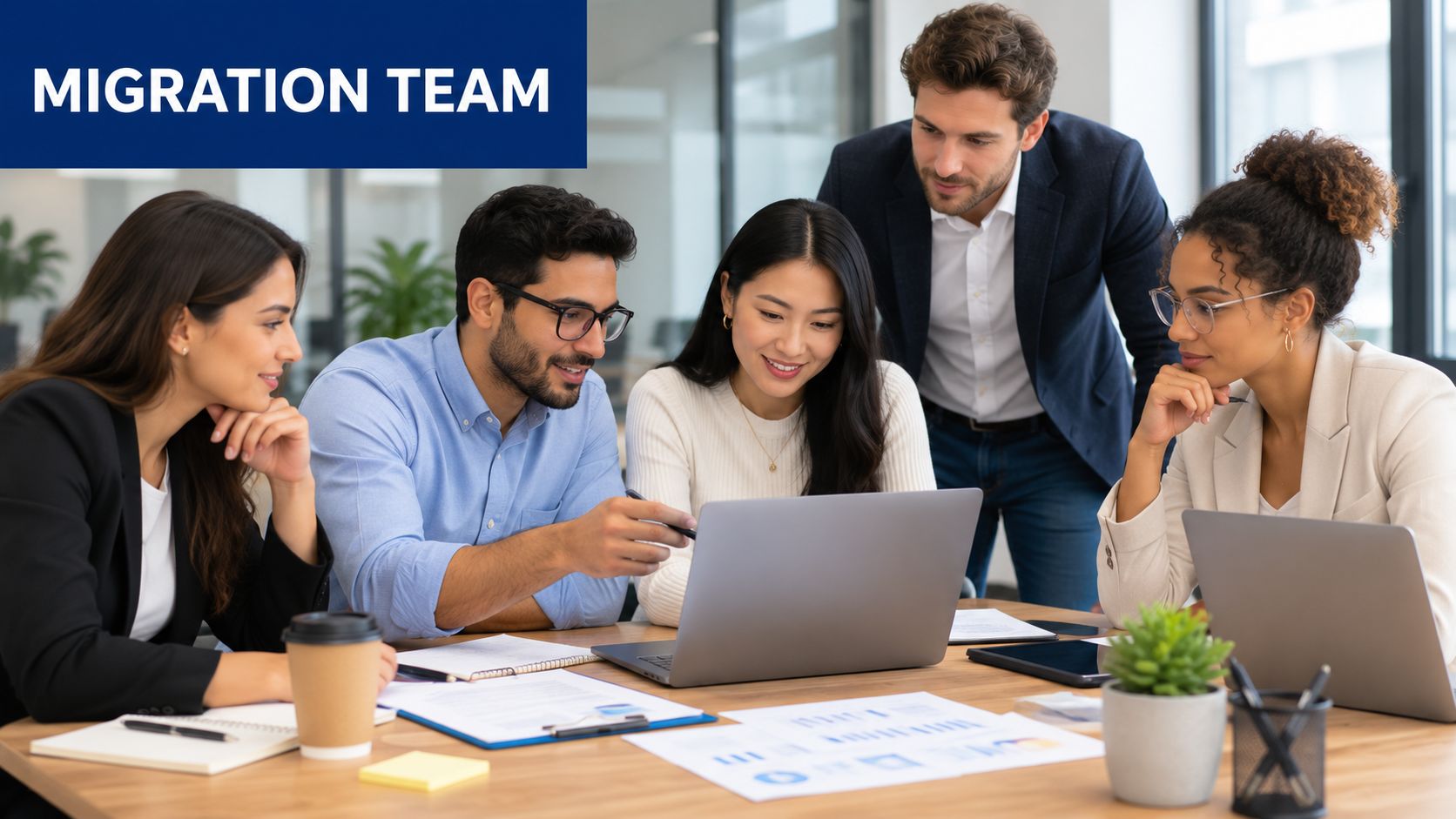 A professional business team collaborating on a cloud migration project while working together in an office.